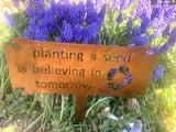 PLANTING A SEED IS BELIEVING IN TOMORROW, metal sign