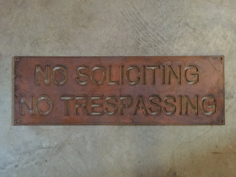 Metal  NO SOLICITING No TRESPASSING sign in copper patina