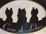 Metal sign with adorable dog silhouettes