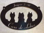 Metal sign with adorable dog silhouettes