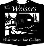 Metal FISHERMAN sign with fisherman and cabin