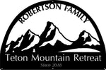 Metal mountain sign with TETON MOUNTAIN RETREAT