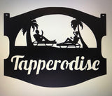 Metal sign ,beach couple lounging,  palm trees