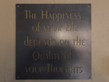 the Happiness of your life depends on the quality of your thoughts metal wall hanging