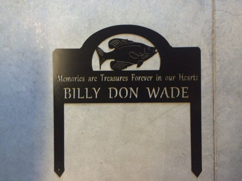 Metal FISH in memory sign on stakes
