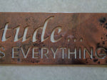Metal sign, Attitude Changes Everything