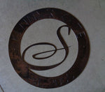 Metal monogram in black textured baked on  finish