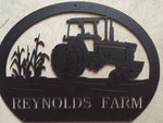 metal tractor sign with  corn stalks and  tractor