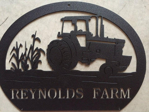 metal tractor sign with  corn stalks and  tractor