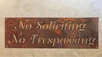 Metal  NO SOLICITING No TRESPASSING sign