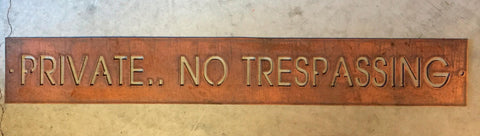 Metal PRIVATE NO TRESPASSING sign in copper finish