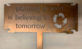 PLANTING A SEED IS BELIEVING IN TOMORROW, metal sign